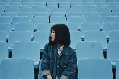 sitting in chair